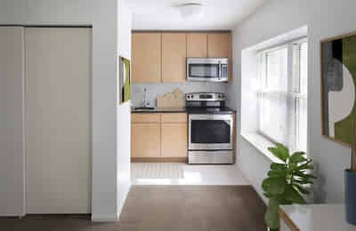 Room?w=400&h=260&fit=crop&q=40&auto=format&trim=auto